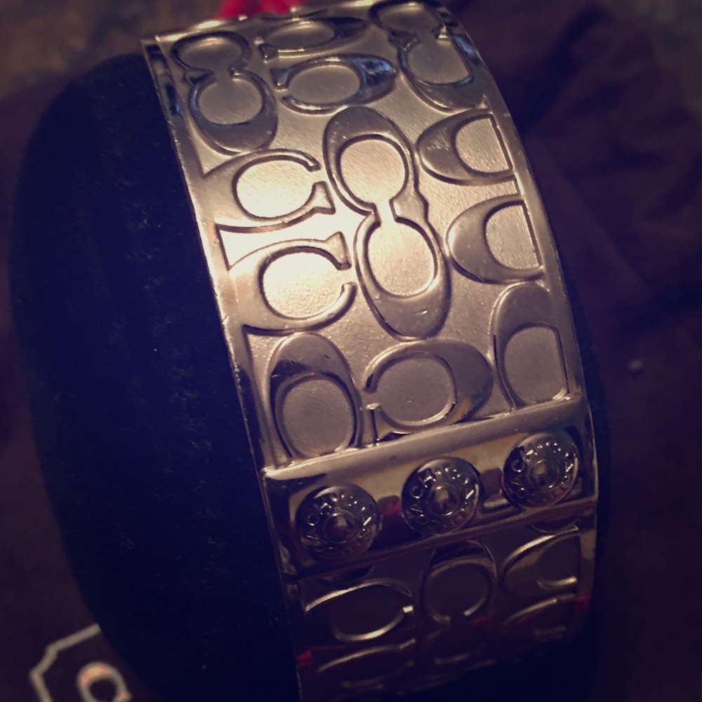 Coach plated silver bangle bracelet.